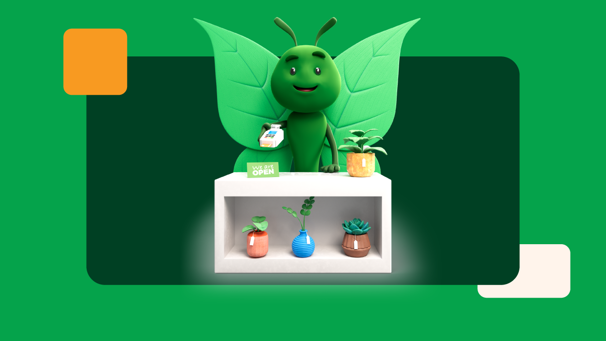 Green butterfly mascot operating a small retail counter with plants and a card payment terminal, representing sustainable business growth, customer service and energy-efficient retail operations.