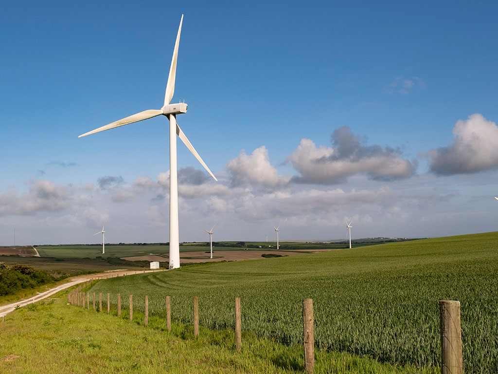 ScottishPower wind turbines at Carland Cross wind farm in Cornwall producing renewable electricity and supporting clean energy generation in the UK