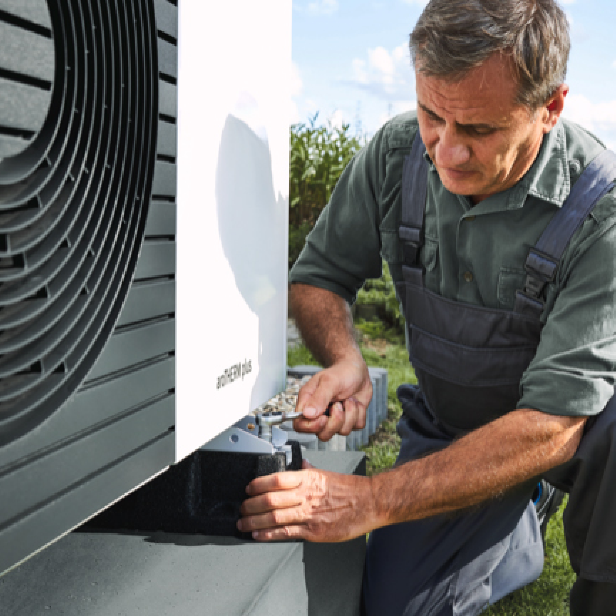 worker-installing-heat-pump